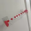 Ablakra helyezhető tapadókorongos etetőcső