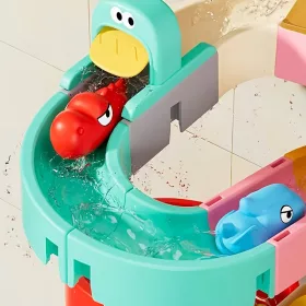   Interaktív vízi játékkészlet dinoszaurusz pályákkal, csúszdákkal és építőkockákkal